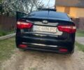 Чорний Кіа Ріо, об'ємом двигуна 1.4 л та пробігом 160 тис. км за 7600 $, фото 1 на Automoto.ua