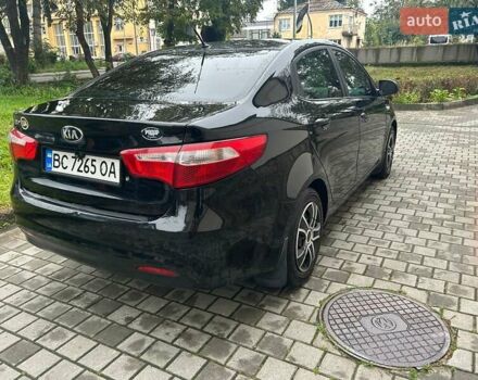Чорний Кіа Ріо, об'ємом двигуна 1.4 л та пробігом 141 тис. км за 7200 $, фото 9 на Automoto.ua