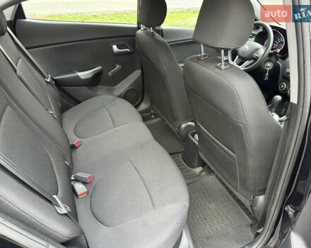 Чорний Кіа Ріо, об'ємом двигуна 1.4 л та пробігом 45 тис. км за 9800 $, фото 25 на Automoto.ua