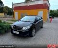 Чорний Кіа Ріо, об'ємом двигуна 1.4 л та пробігом 87 тис. км за 7700 $, фото 1 на Automoto.ua