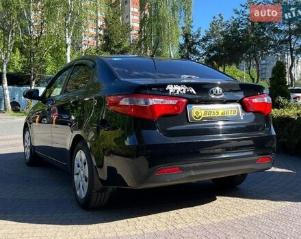 Чорний Кіа Ріо, об'ємом двигуна 1.4 л та пробігом 215 тис. км за 6999 $, фото 4 на Automoto.ua