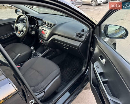 Черный Киа Рио, объемом двигателя 1.4 л и пробегом 305 тыс. км за 4950 $, фото 13 на Automoto.ua