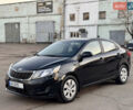 Черный Киа Рио, объемом двигателя 1.4 л и пробегом 305 тыс. км за 4950 $, фото 1 на Automoto.ua