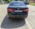 Чорний Кіа Ріо, об'ємом двигуна 1.4 л та пробігом 186 тис. км за 6800 $, фото 1 на Automoto.ua
