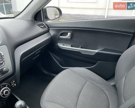 Черный Киа Рио, объемом двигателя 1.4 л и пробегом 124 тыс. км за 9350 $, фото 89 на Automoto.ua