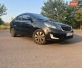 Черный Киа Рио, объемом двигателя 1.6 л и пробегом 155 тыс. км за 8500 $, фото 1 на Automoto.ua