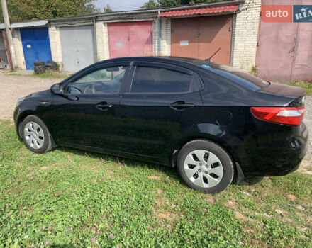 Черный Киа Рио, объемом двигателя 1.4 л и пробегом 212 тыс. км за 7800 $, фото 4 на Automoto.ua