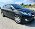 Чорний Кіа Ріо, об'ємом двигуна 1.6 л та пробігом 142 тис. км за 6800 $, фото 1 на Automoto.ua