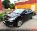 Чорний Кіа Ріо, об'ємом двигуна 1.4 л та пробігом 87 тис. км за 7700 $, фото 1 на Automoto.ua
