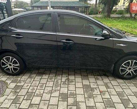 Чорний Кіа Ріо, об'ємом двигуна 1.4 л та пробігом 141 тис. км за 7200 $, фото 1 на Automoto.ua