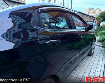 Чорний Кіа Ріо, об'ємом двигуна 1.4 л та пробігом 87 тис. км за 7700 $, фото 7 на Automoto.ua