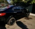 Чорний Кіа Ріо, об'ємом двигуна 1.4 л та пробігом 73 тис. км за 9000 $, фото 2 на Automoto.ua