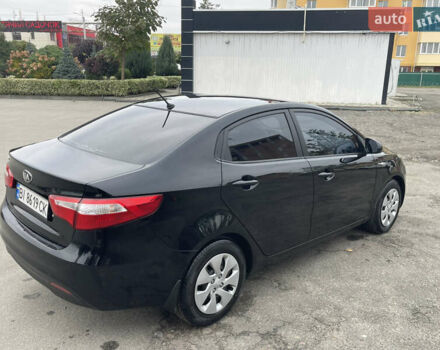Черный Киа Рио, объемом двигателя 1.4 л и пробегом 136 тыс. км за 7700 $, фото 10 на Automoto.ua