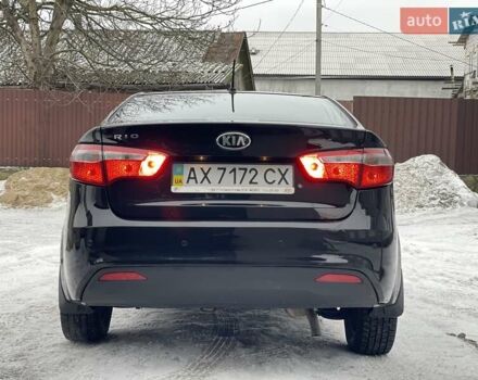 Черный Киа Рио, объемом двигателя 1.4 л и пробегом 124 тыс. км за 9350 $, фото 14 на Automoto.ua