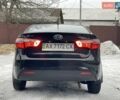 Черный Киа Рио, объемом двигателя 1.4 л и пробегом 124 тыс. км за 9350 $, фото 14 на Automoto.ua