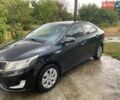 Чорний Кіа Ріо, об'ємом двигуна 1.4 л та пробігом 88 тис. км за 8300 $, фото 4 на Automoto.ua