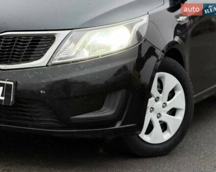 Черный Киа Рио, объемом двигателя 1.4 л и пробегом 220 тыс. км за 8200 $, фото 2 на Automoto.ua