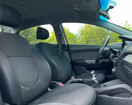 Чорний Кіа Ріо, об'ємом двигуна 1.4 л та пробігом 141 тис. км за 7990 $, фото 8 на Automoto.ua