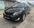 Черный Киа Рио, объемом двигателя 1.6 л и пробегом 61 тыс. км за 10319 $, фото 1 на Automoto.ua