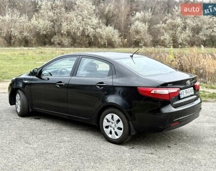 Чорний Кіа Ріо, об'ємом двигуна 1.4 л та пробігом 45 тис. км за 9800 $, фото 9 на Automoto.ua