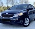 Чорний Кіа Ріо, об'ємом двигуна 1.4 л та пробігом 160 тис. км за 7800 $, фото 1 на Automoto.ua