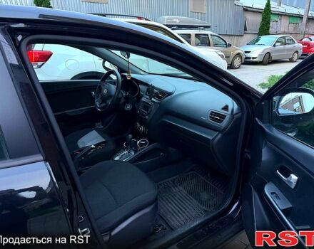Чорний Кіа Ріо, об'ємом двигуна 1.4 л та пробігом 87 тис. км за 7700 $, фото 8 на Automoto.ua