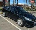 Черный Киа Рио, объемом двигателя 1.4 л и пробегом 139 тыс. км за 10000 $, фото 1 на Automoto.ua