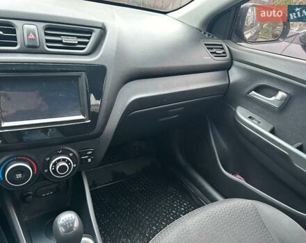 Чорний Кіа Ріо, об'ємом двигуна 1.4 л та пробігом 141 тис. км за 7200 $, фото 3 на Automoto.ua