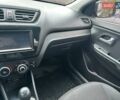 Чорний Кіа Ріо, об'ємом двигуна 1.4 л та пробігом 141 тис. км за 7200 $, фото 3 на Automoto.ua