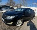 Черный Киа Рио, объемом двигателя 1.4 л и пробегом 214 тыс. км за 7700 $, фото 1 на Automoto.ua