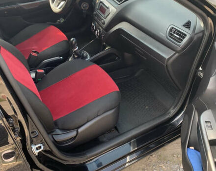 Черный Киа Рио, объемом двигателя 1.4 л и пробегом 212 тыс. км за 7800 $, фото 7 на Automoto.ua