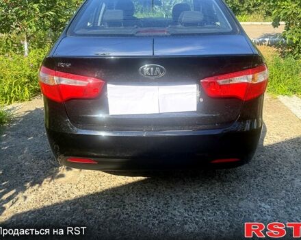 Черный Киа Рио, объемом двигателя 1.4 л и пробегом 109 тыс. км за 8100 $, фото 5 на Automoto.ua