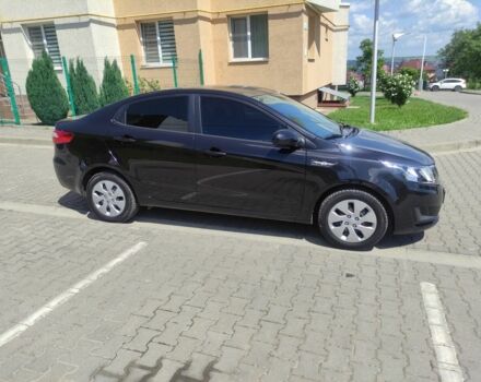 Черный Киа Рио, объемом двигателя 1.4 л и пробегом 186 тыс. км за 6800 $, фото 1 на Automoto.ua