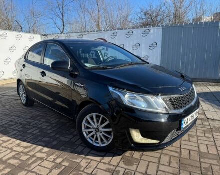 Чорний Кіа Ріо, об'ємом двигуна 1.4 л та пробігом 213 тис. км за 7200 $, фото 1 на Automoto.ua