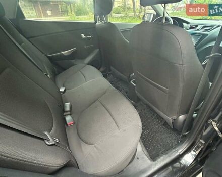 Чорний Кіа Ріо, об'ємом двигуна 1.4 л та пробігом 141 тис. км за 7200 $, фото 10 на Automoto.ua