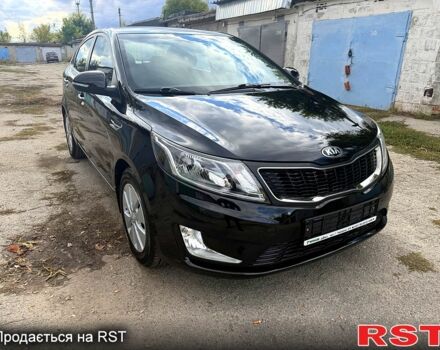 Чорний Кіа Ріо, об'ємом двигуна 1.6 л та пробігом 61 тис. км за 10000 $, фото 2 на Automoto.ua