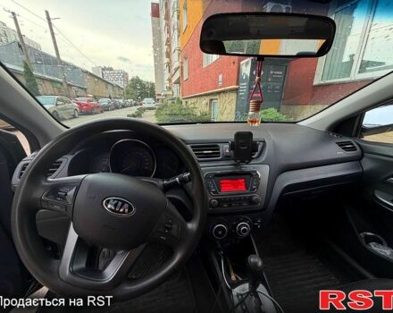 Чорний Кіа Ріо, об'ємом двигуна 1.4 л та пробігом 87 тис. км за 7700 $, фото 10 на Automoto.ua
