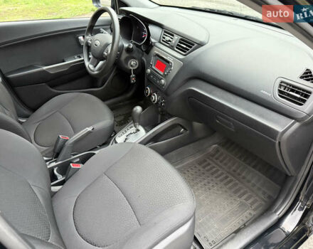 Чорний Кіа Ріо, об'ємом двигуна 1.4 л та пробігом 45 тис. км за 9800 $, фото 21 на Automoto.ua