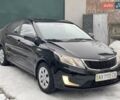 Черный Киа Рио, объемом двигателя 1.4 л и пробегом 124 тыс. км за 9350 $, фото 3 на Automoto.ua