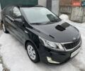 Черный Киа Рио, объемом двигателя 1.4 л и пробегом 124 тыс. км за 9350 $, фото 37 на Automoto.ua
