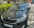 Черный Киа Рио, объемом двигателя 1.4 л и пробегом 126 тыс. км за 8700 $, фото 1 на Automoto.ua