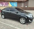 Чорний Кіа Ріо, об'ємом двигуна 1.4 л та пробігом 96 тис. км за 8200 $, фото 1 на Automoto.ua