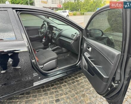 Чорний Кіа Ріо, об'ємом двигуна 1.4 л та пробігом 107 тис. км за 7500 $, фото 7 на Automoto.ua