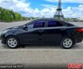 Чорний Кіа Ріо, об'ємом двигуна 14 л та пробігом 96 тис. км за 8600 $, фото 1 на Automoto.ua