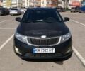 Чорний Кіа Ріо, об'ємом двигуна 1.4 л та пробігом 177 тис. км за 6800 $, фото 1 на Automoto.ua