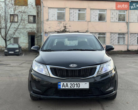 Черный Киа Рио, объемом двигателя 1.4 л и пробегом 305 тыс. км за 4950 $, фото 2 на Automoto.ua