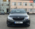 Черный Киа Рио, объемом двигателя 1.4 л и пробегом 305 тыс. км за 4950 $, фото 2 на Automoto.ua