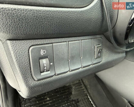 Чорний Кіа Ріо, об'ємом двигуна 1.4 л та пробігом 123 тис. км за 7300 $, фото 18 на Automoto.ua