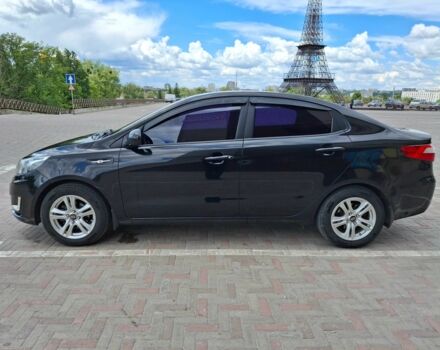 Чорний Кіа Ріо, об'ємом двигуна 1.4 л та пробігом 96 тис. км за 8200 $, фото 2 на Automoto.ua
