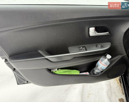 Чорний Кіа Ріо, об'ємом двигуна 1.4 л та пробігом 123 тис. км за 7300 $, фото 21 на Automoto.ua